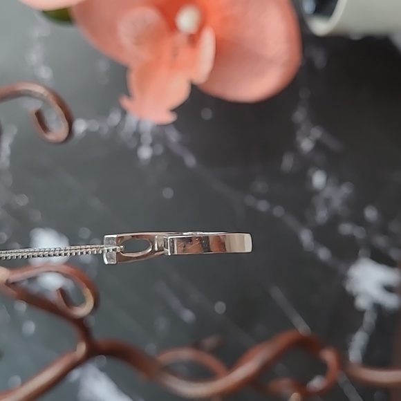 14KT WHITE GOLD TENSION SET DIAMOND PENDANT - Picture 4 of 13